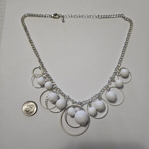 Costume Jewelry Pearl Necklace with Silver Toned Rings and White Beads
